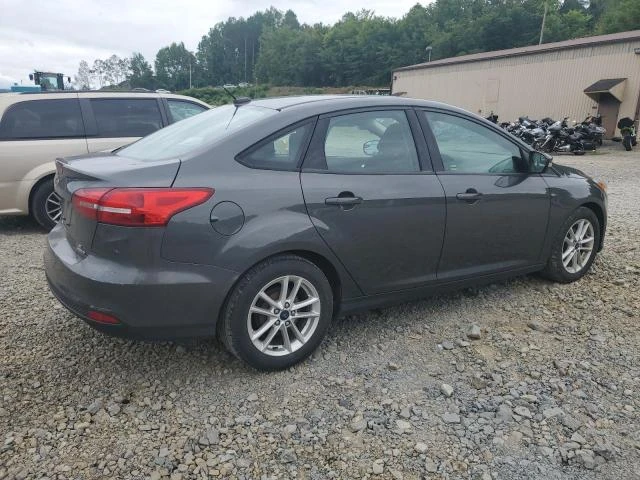 Photo 2 VIN: 1FADP3F24GL377789 - FORD FOCUS SE 