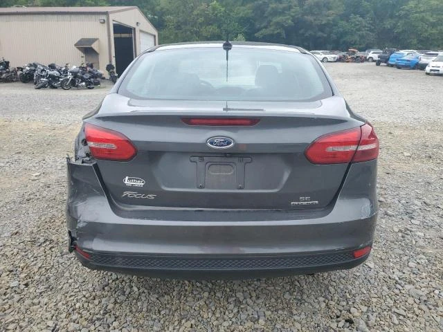 Photo 5 VIN: 1FADP3F24GL377789 - FORD FOCUS SE 