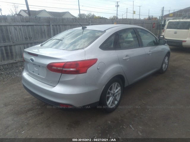 Photo 3 VIN: 1FADP3F24GL377808 - FORD FOCUS 