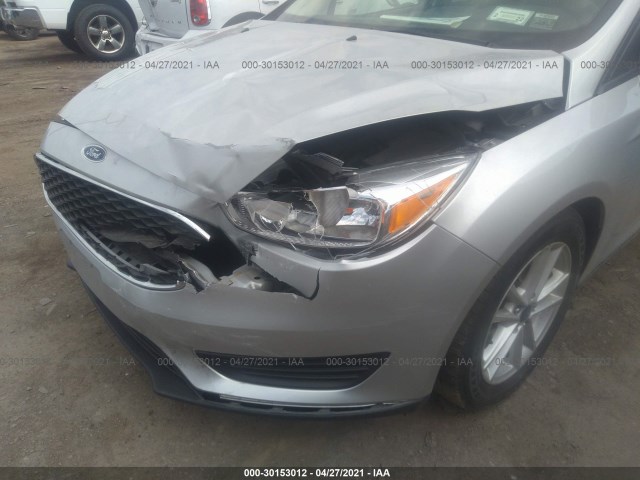 Photo 5 VIN: 1FADP3F24GL377808 - FORD FOCUS 