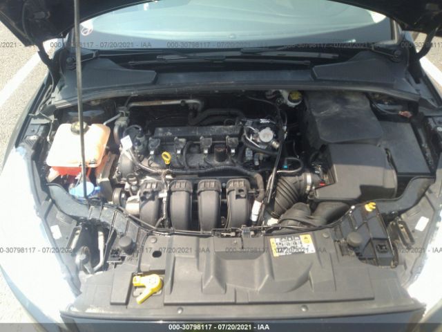 Photo 9 VIN: 1FADP3F24GL378747 - FORD FOCUS 