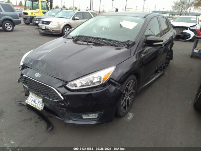 Photo 1 VIN: 1FADP3F24GL383852 - FORD FOCUS 