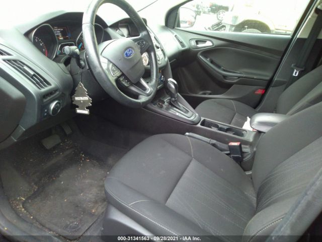 Photo 4 VIN: 1FADP3F24GL383852 - FORD FOCUS 