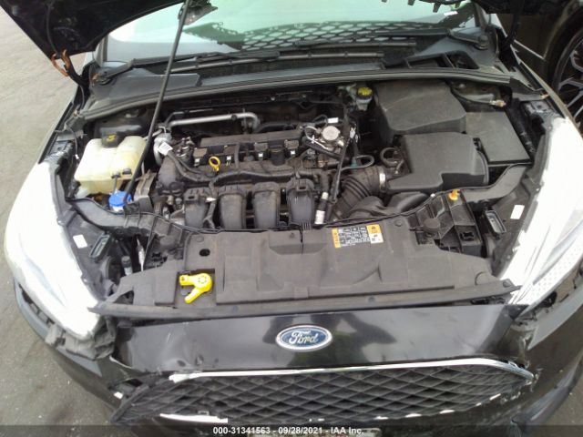 Photo 9 VIN: 1FADP3F24GL383852 - FORD FOCUS 