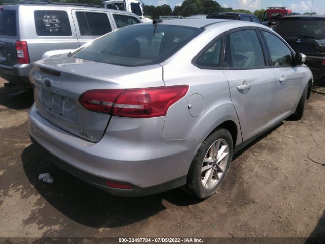 Photo 3 VIN: 1FADP3F24GL385505 - FORD FOCUS 