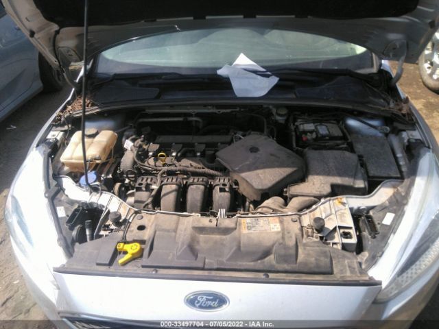 Photo 9 VIN: 1FADP3F24GL385505 - FORD FOCUS 