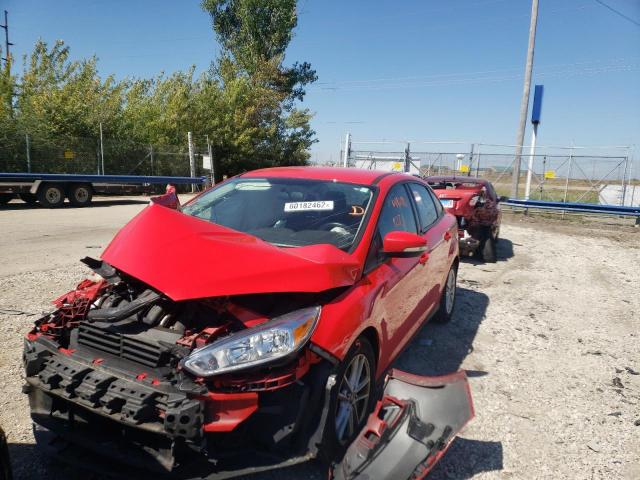 Photo 1 VIN: 1FADP3F24GL386234 - FORD FOCUS SE 