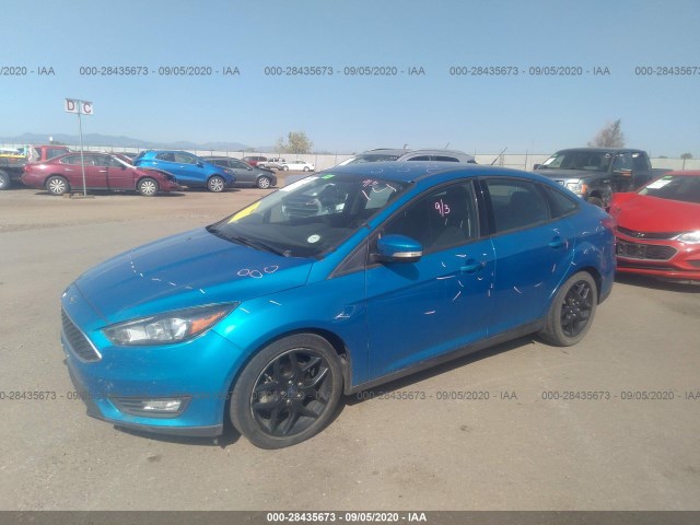 Photo 1 VIN: 1FADP3F24GL387528 - FORD FOCUS 