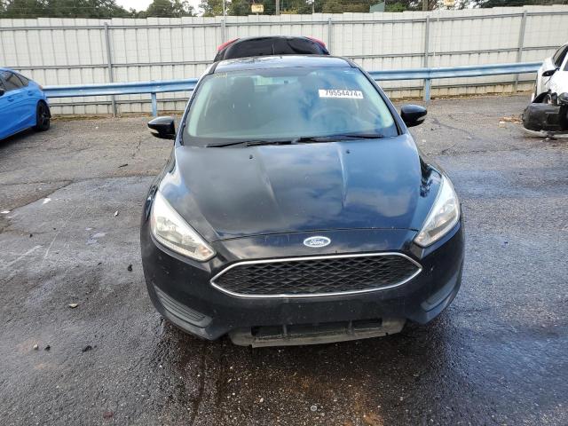 Photo 4 VIN: 1FADP3F24GL390395 - FORD FOCUS SE 