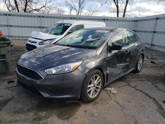 Photo 1 VIN: 1FADP3F24GL394155 - FORD FOCUS SE 