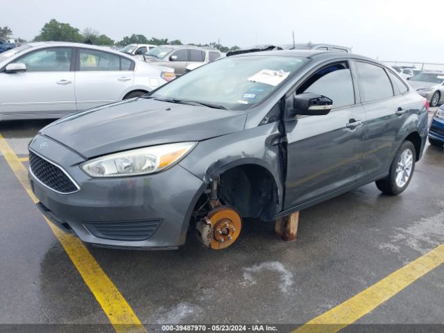 Photo 1 VIN: 1FADP3F24GL395175 - FORD FOCUS 