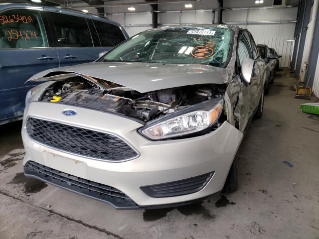 Photo 1 VIN: 1FADP3F24GL395483 - FORD FOCUS SE 