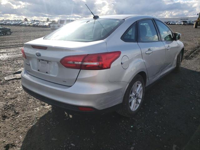 Photo 3 VIN: 1FADP3F24GL396097 - FORD FOCUS SE 