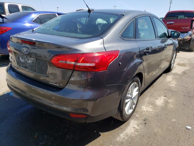 Photo 3 VIN: 1FADP3F24GL397444 - FORD FOCUS SE 