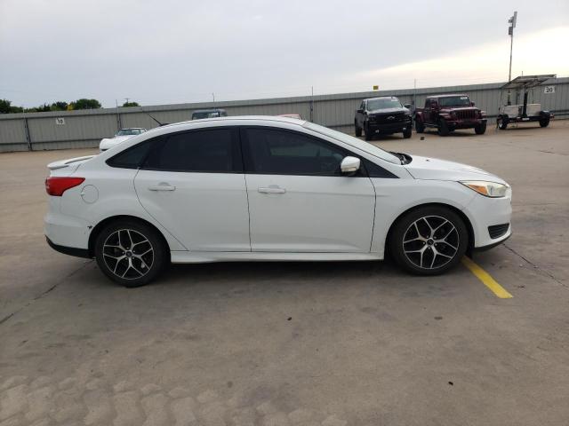 Photo 8 VIN: 1FADP3F24GL398688 - FORD FOCUS SE 