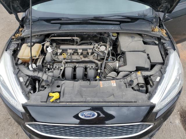 Photo 10 VIN: 1FADP3F24GL400763 - FORD FOCUS 