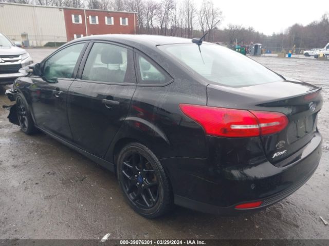 Photo 2 VIN: 1FADP3F24GL400939 - FORD FOCUS 