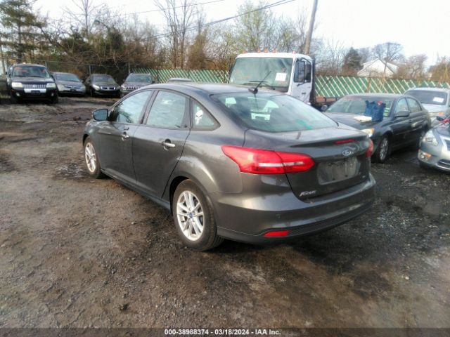 Photo 2 VIN: 1FADP3F24GL401038 - FORD FOCUS 