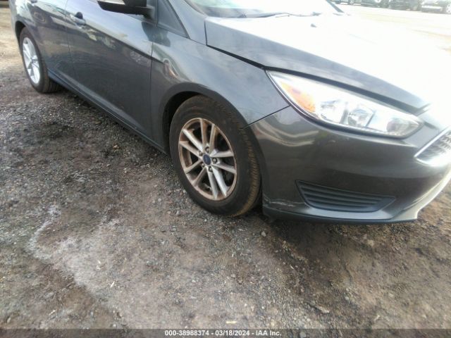 Photo 5 VIN: 1FADP3F24GL401038 - FORD FOCUS 