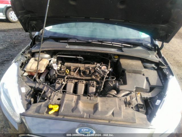 Photo 9 VIN: 1FADP3F24GL401038 - FORD FOCUS 