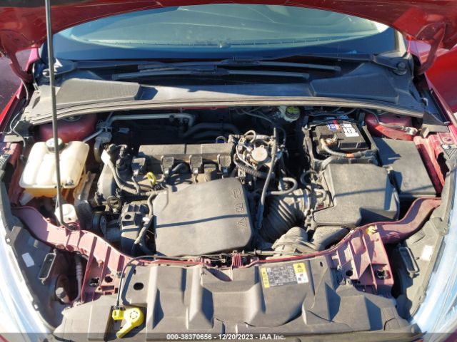 Photo 9 VIN: 1FADP3F24GL402612 - FORD FOCUS 