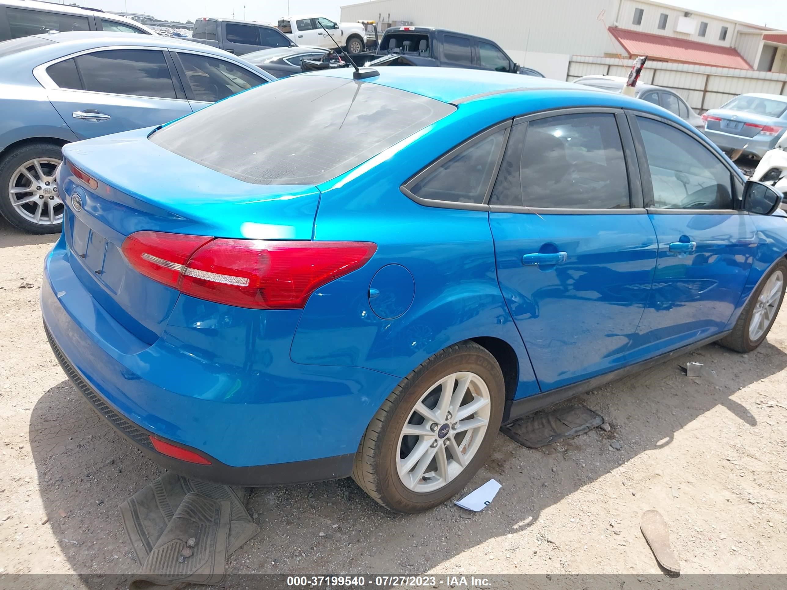 Photo 3 VIN: 1FADP3F24GL404571 - FORD FOCUS 