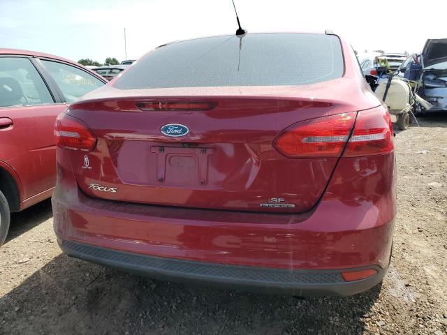 Photo 5 VIN: 1FADP3F24GL405445 - FORD FOCUS SE 