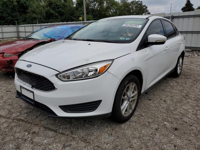 Photo 1 VIN: 1FADP3F24HL211242 - FORD FOCUS SE 