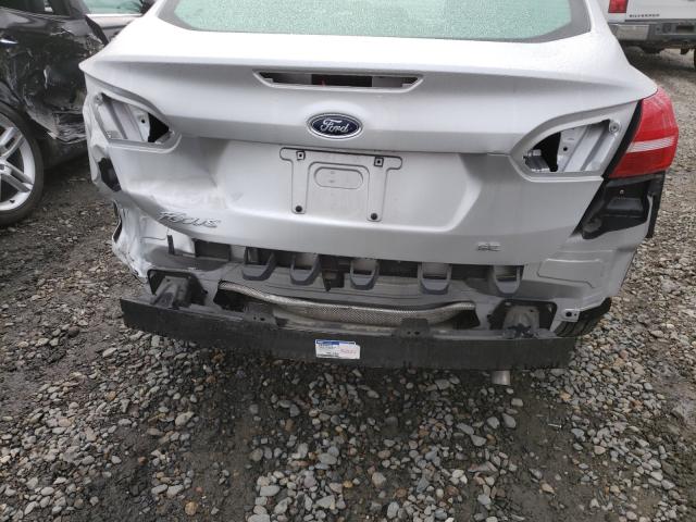 Photo 8 VIN: 1FADP3F24HL223441 - FORD FOCUS 