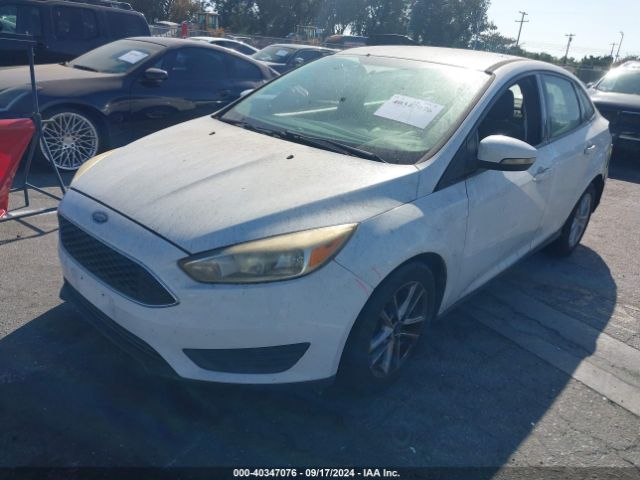 Photo 1 VIN: 1FADP3F24HL237856 - FORD FOCUS 