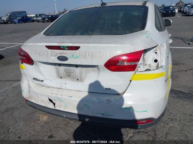 Photo 5 VIN: 1FADP3F24HL237856 - FORD FOCUS 