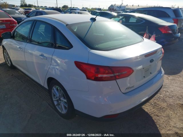 Photo 2 VIN: 1FADP3F24HL249103 - FORD FOCUS 