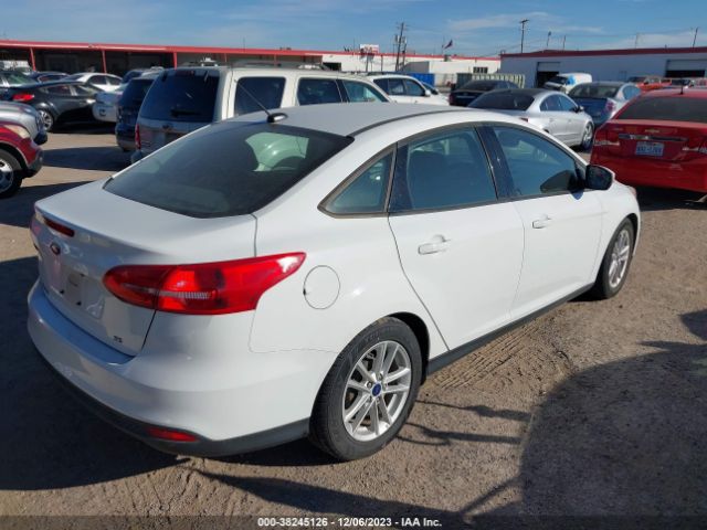 Photo 3 VIN: 1FADP3F24HL249103 - FORD FOCUS 