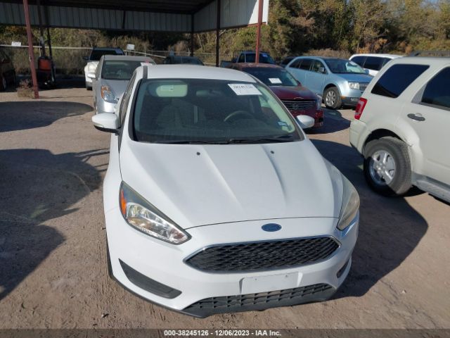 Photo 5 VIN: 1FADP3F24HL249103 - FORD FOCUS 