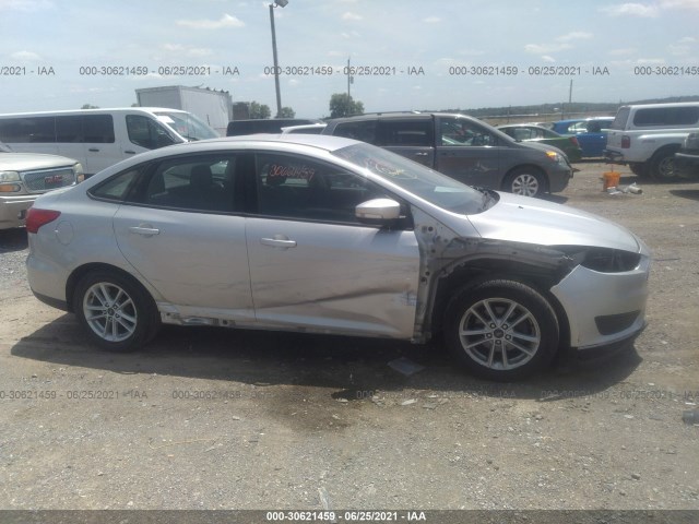 Photo 5 VIN: 1FADP3F24HL280058 - FORD FOCUS 