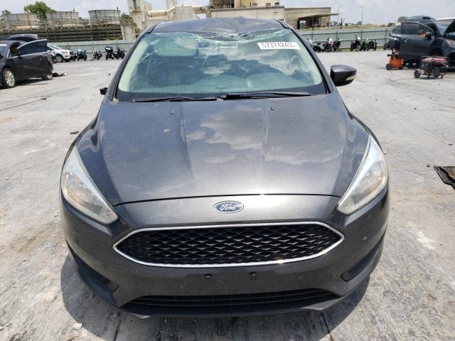 Photo 4 VIN: 1FADP3F24HL290928 - FORD FOCUS SE 