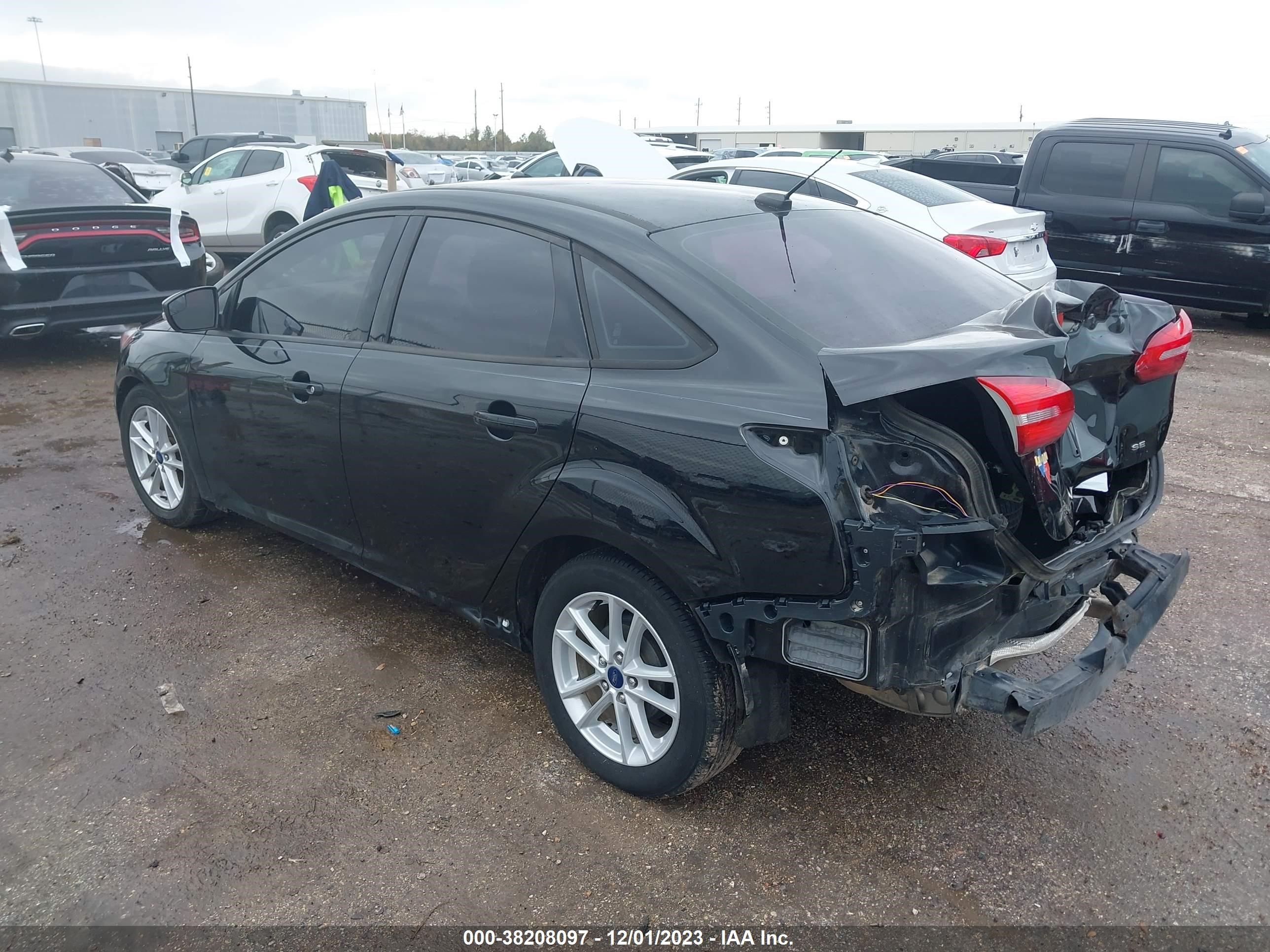 Photo 2 VIN: 1FADP3F24HL299175 - FORD FOCUS 