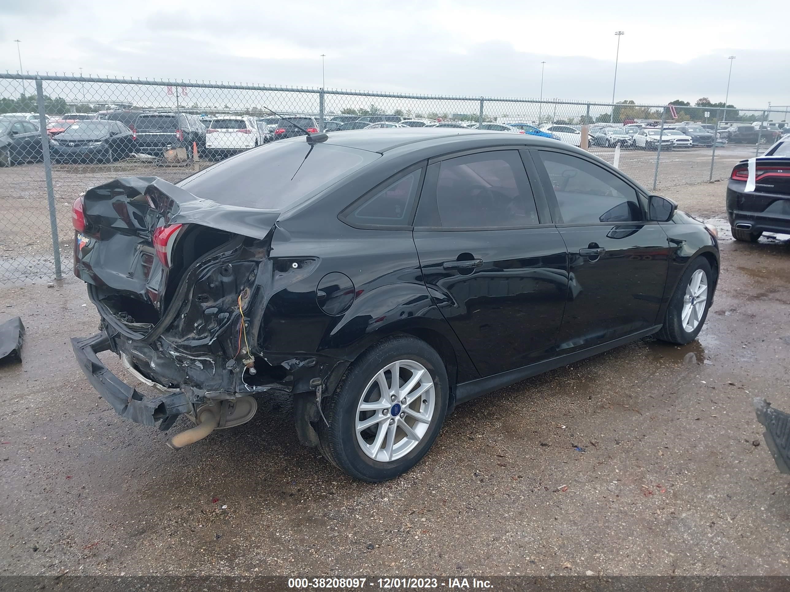 Photo 3 VIN: 1FADP3F24HL299175 - FORD FOCUS 