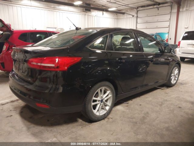 Photo 3 VIN: 1FADP3F24HL303628 - FORD FOCUS 