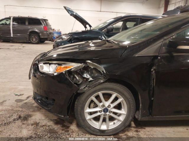 Photo 5 VIN: 1FADP3F24HL303628 - FORD FOCUS 