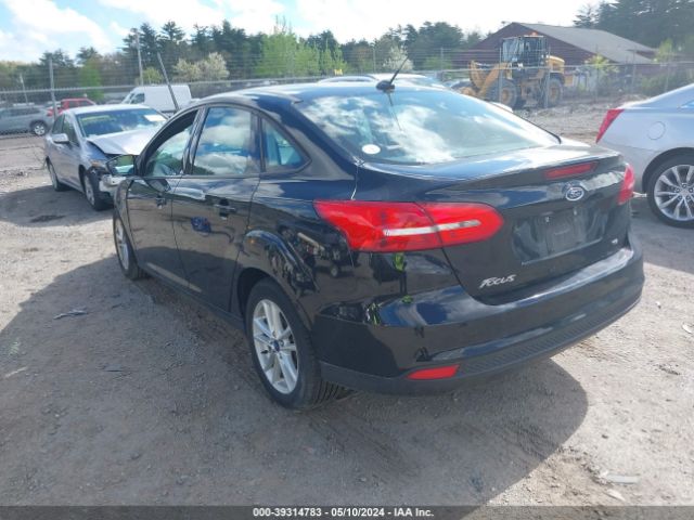 Photo 2 VIN: 1FADP3F24HL308022 - FORD FOCUS 