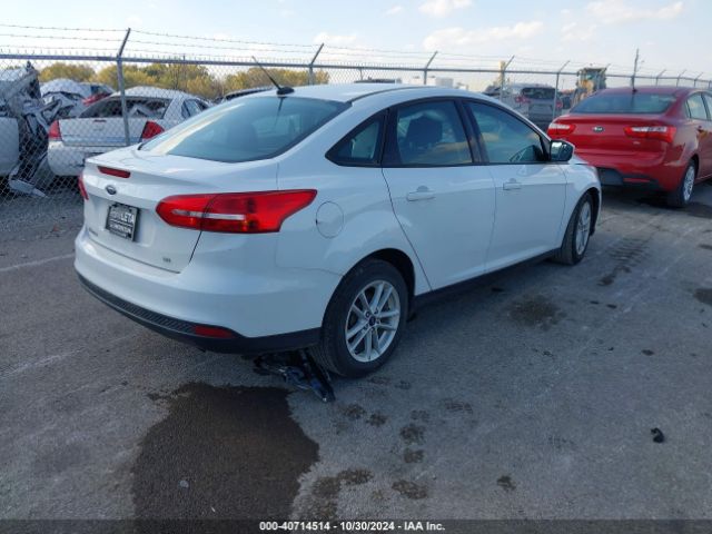 Photo 3 VIN: 1FADP3F24JL207486 - FORD FOCUS 