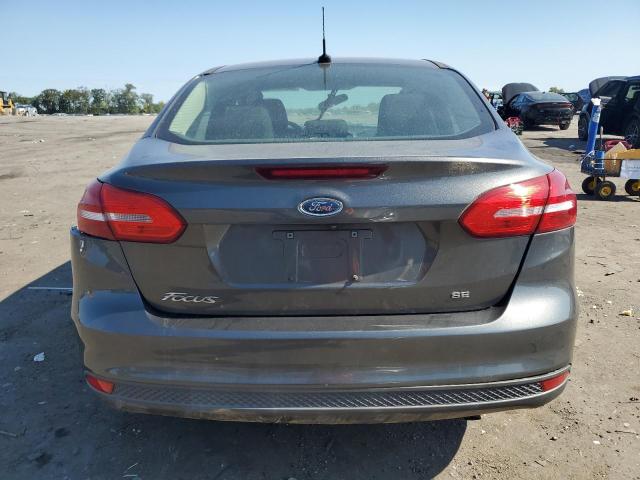 Photo 5 VIN: 1FADP3F24JL212400 - FORD FOCUS SE 