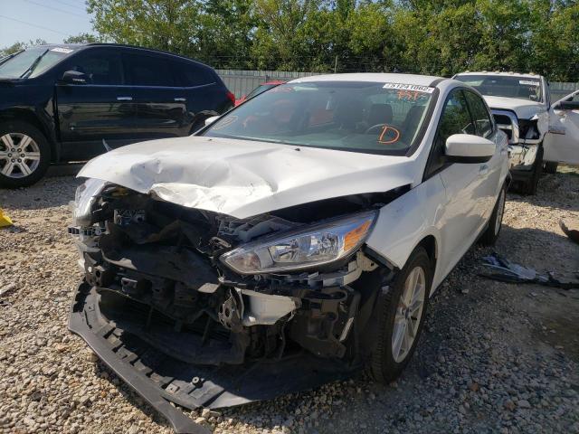 Photo 1 VIN: 1FADP3F24JL215815 - FORD FOCUS SE 