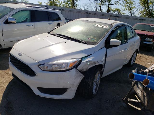 Photo 1 VIN: 1FADP3F24JL218018 - FORD FOCUS 