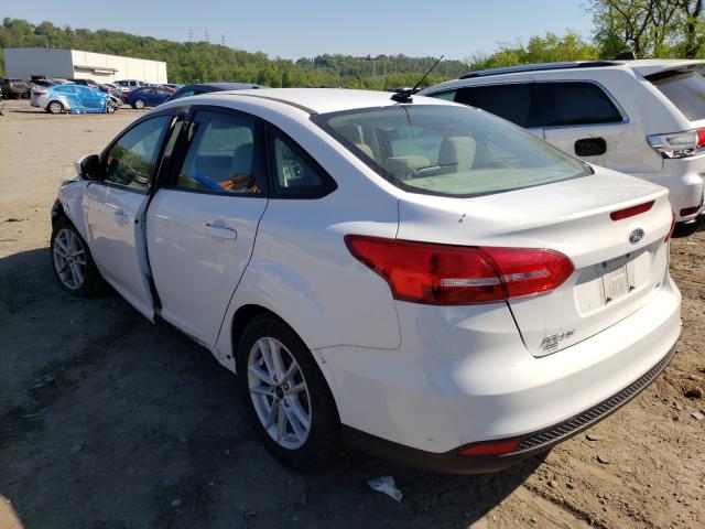 Photo 2 VIN: 1FADP3F24JL218018 - FORD FOCUS 