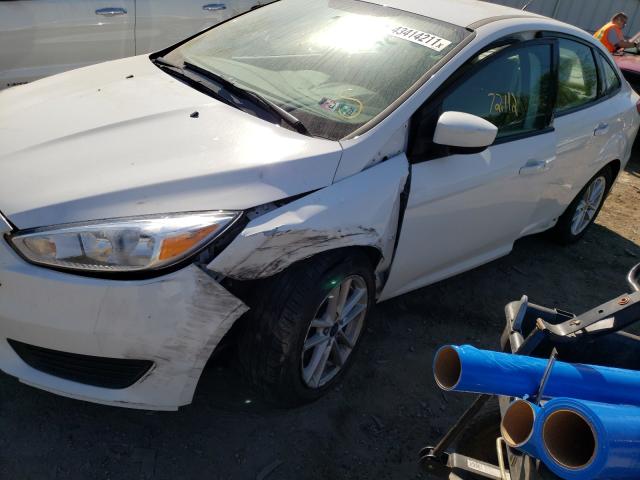 Photo 8 VIN: 1FADP3F24JL218018 - FORD FOCUS 