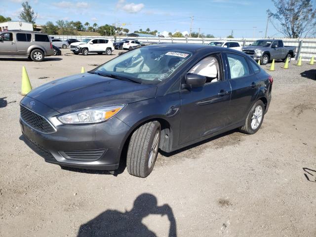 Photo 1 VIN: 1FADP3F24JL225681 - FORD FOCUS SE 