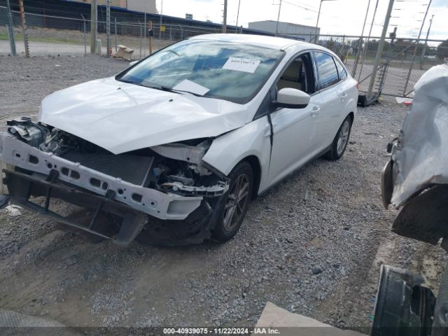 Photo 1 VIN: 1FADP3F24JL237555 - FORD FOCUS 