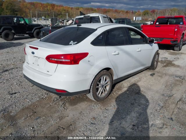 Photo 3 VIN: 1FADP3F24JL237555 - FORD FOCUS 